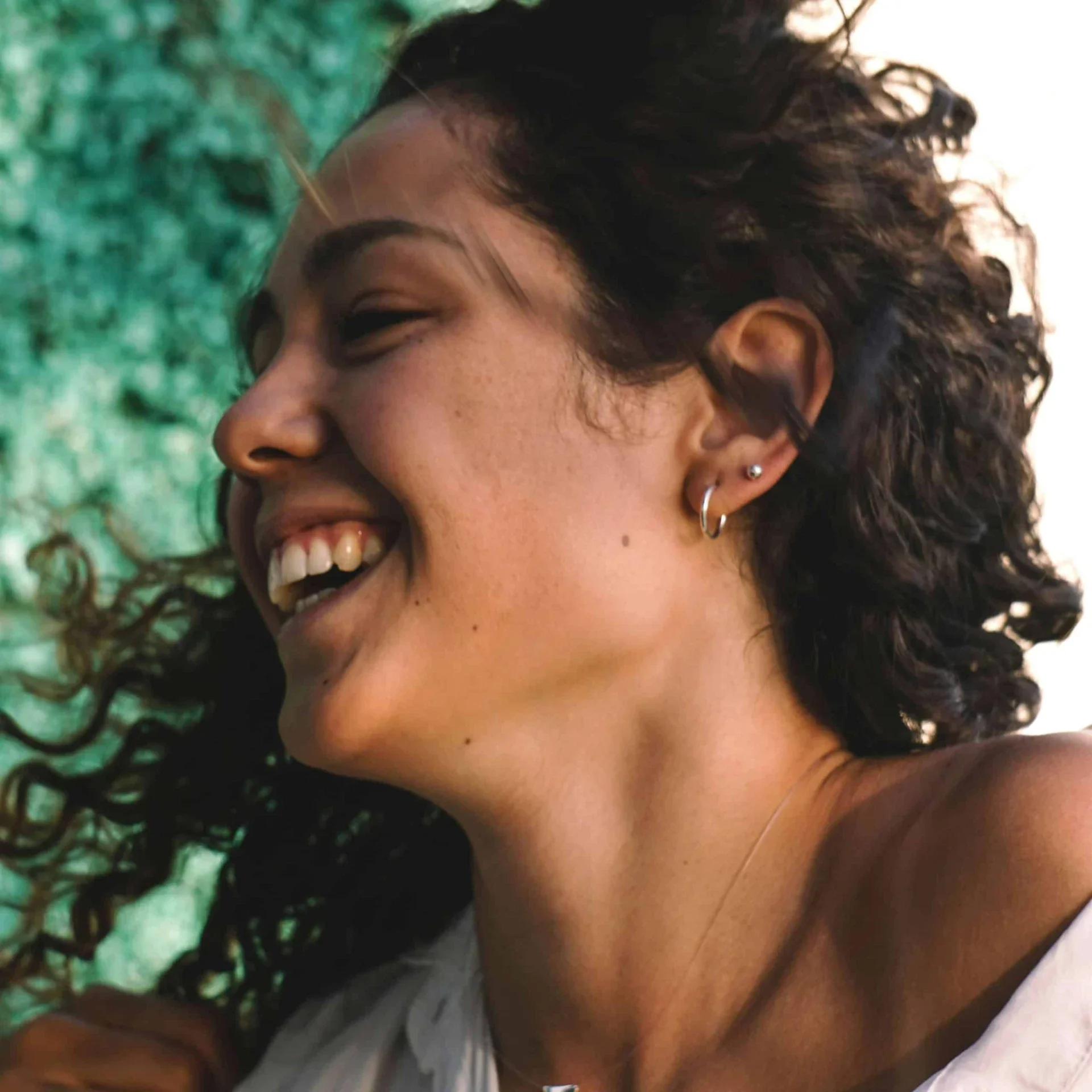 Happy Laughing Girl Showing Jawline happy laughing girl showing jawline