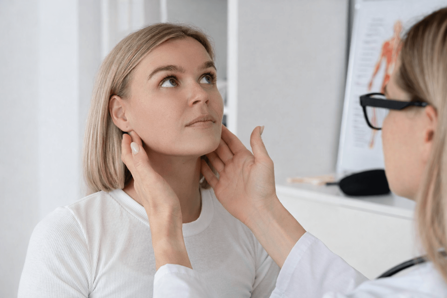 Clinical jaw evaluation with a patient.