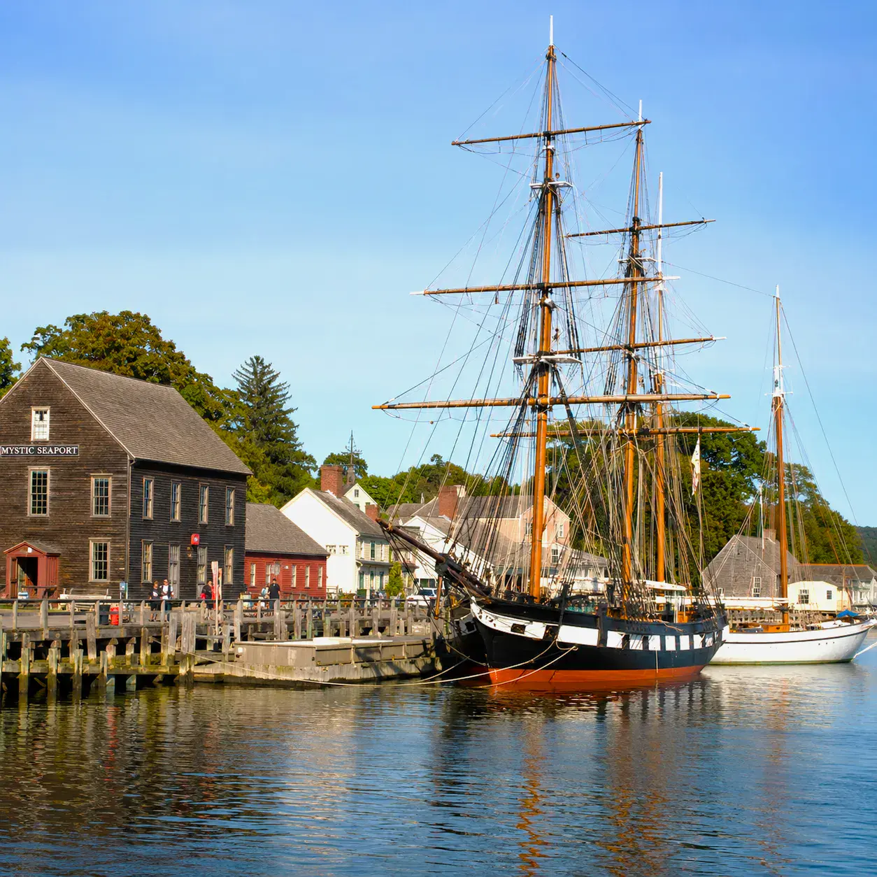 Historic tall ships in the harbor at Mystic Seaport, Connecticut