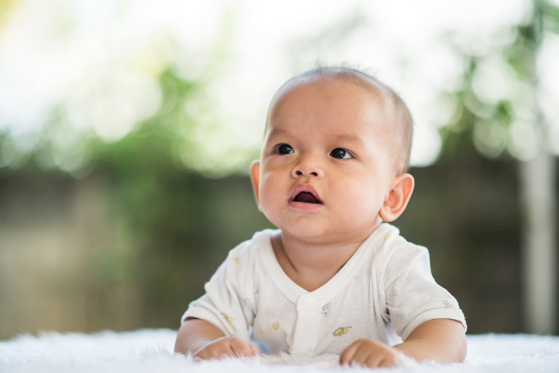 Newborn child relaxing rug.