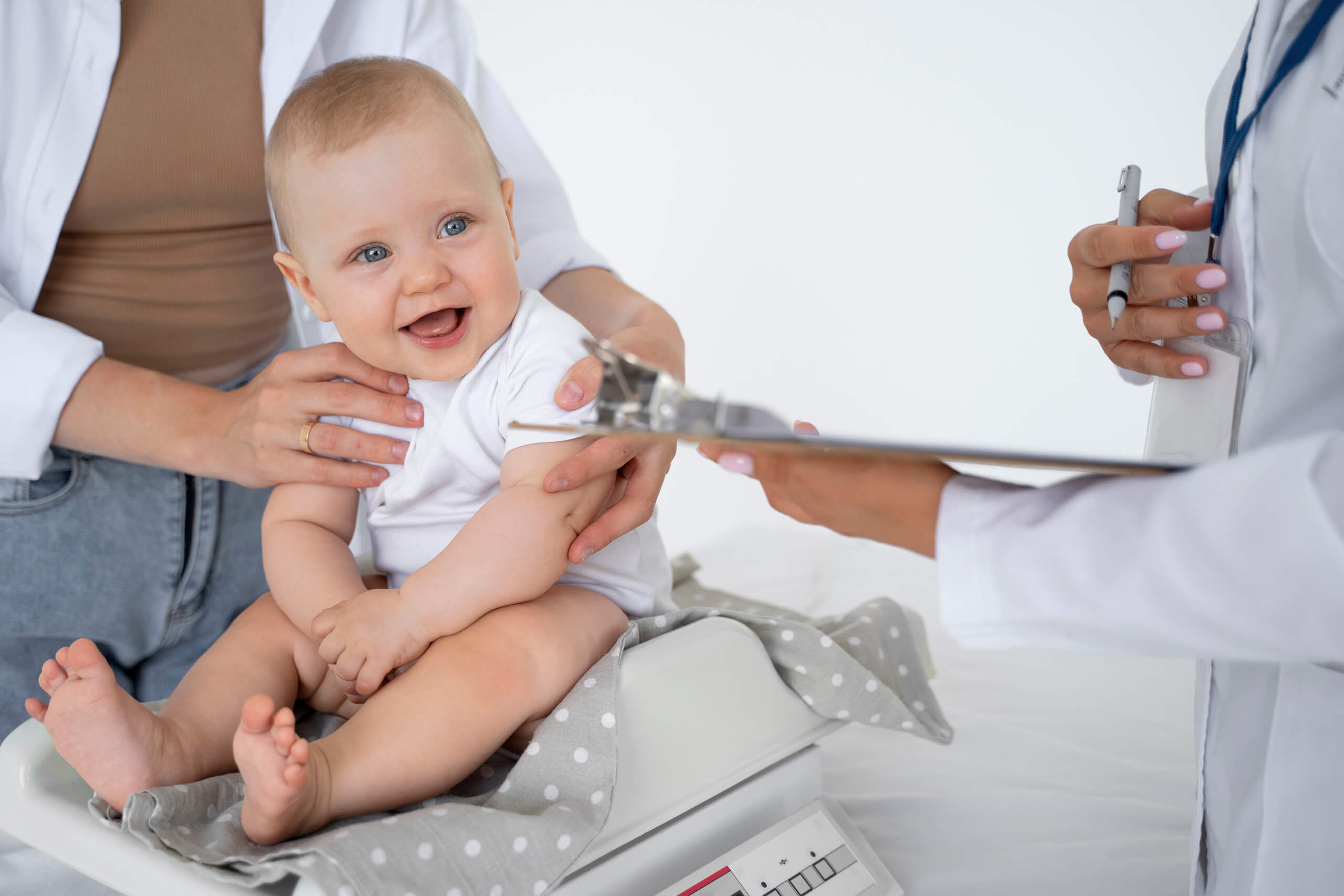 peditrician examining baby