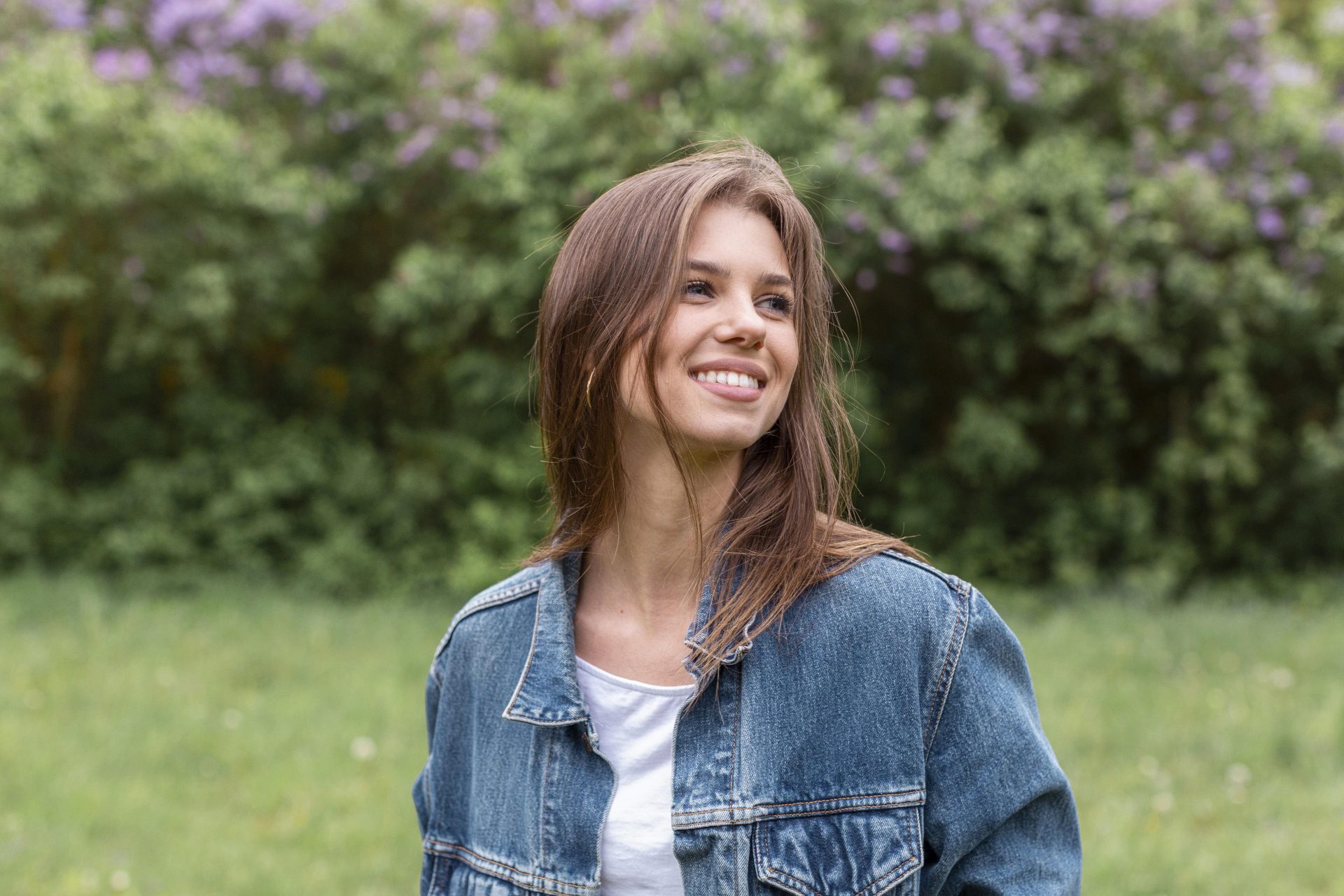 Portrait smilling woman enjoying nature.