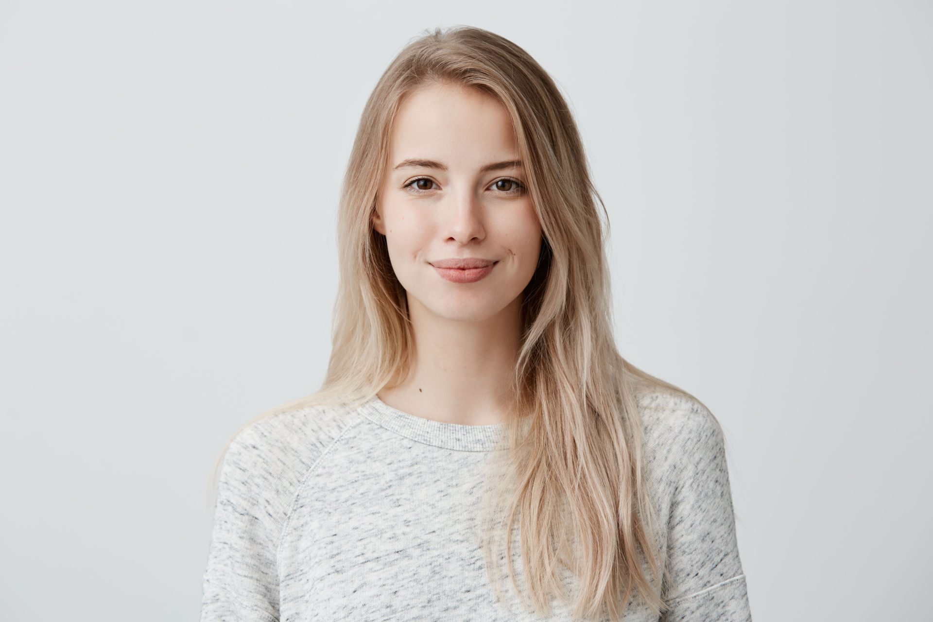 Pretty Smiling Joyfully Female With Blonde hair