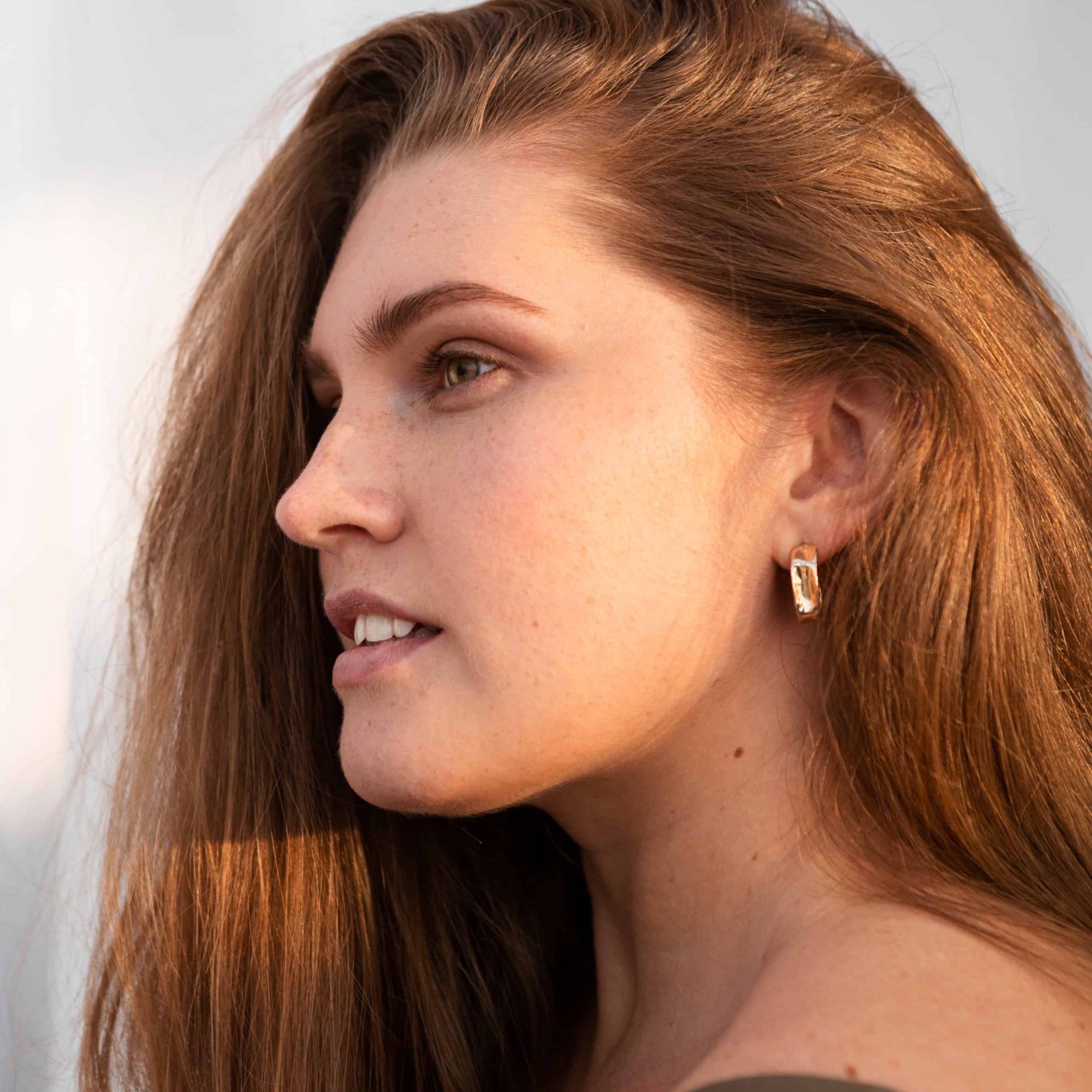 girl smiling sunset light
