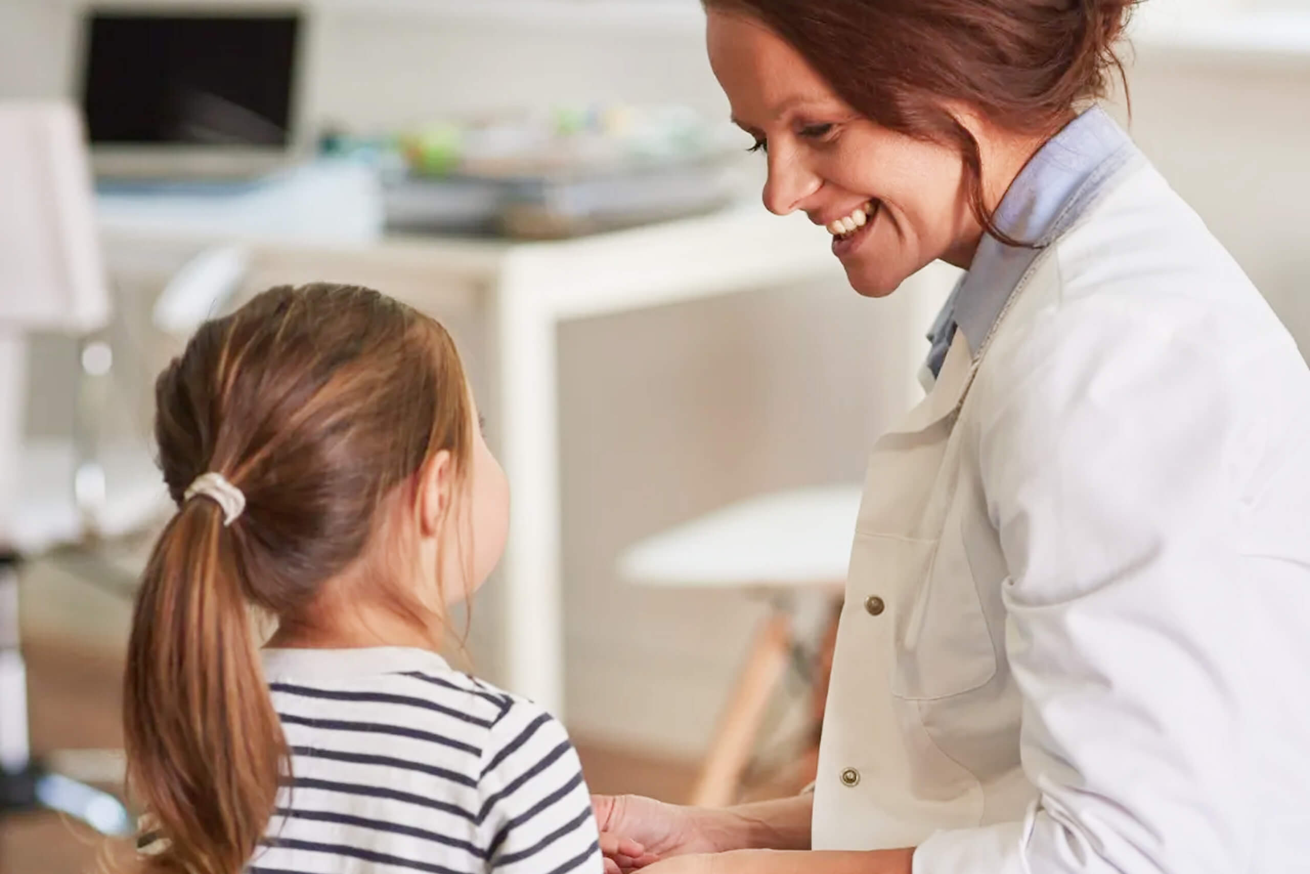 Young girl visiting her doctor.