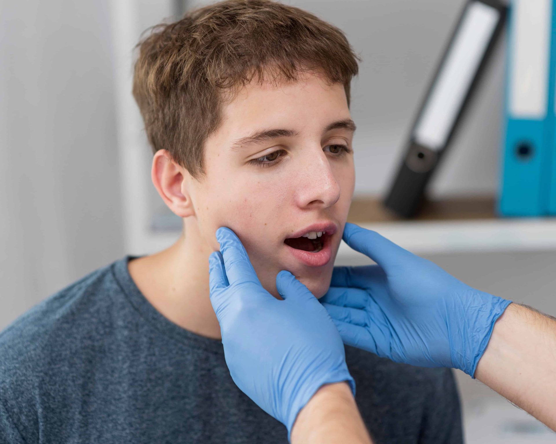 Young man getting facial surgery examination